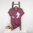 Bigfoot Walking With Bull Terrier Dog Women's Heather T-Shirt Heather Maroon