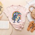 Boston Terrier Riding Dinosaur T-Rex Boys Kids Rainbow Women's Heather T-Shirt Heather Peach