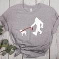 Bigfoot Walking With Bull Terrier Dog Women's Heather T-Shirt Athletic Heather