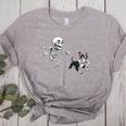 Skeleton Chasing Dog Boston Terrier Halloween Pet Lover Women's Heather T-Shirt Athletic Heather